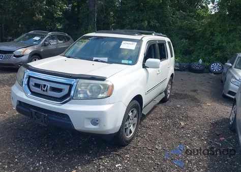 2011 Honda Pilot Touring z USA, uszkodzony, nr VIN 5FNYF4H97BB028586